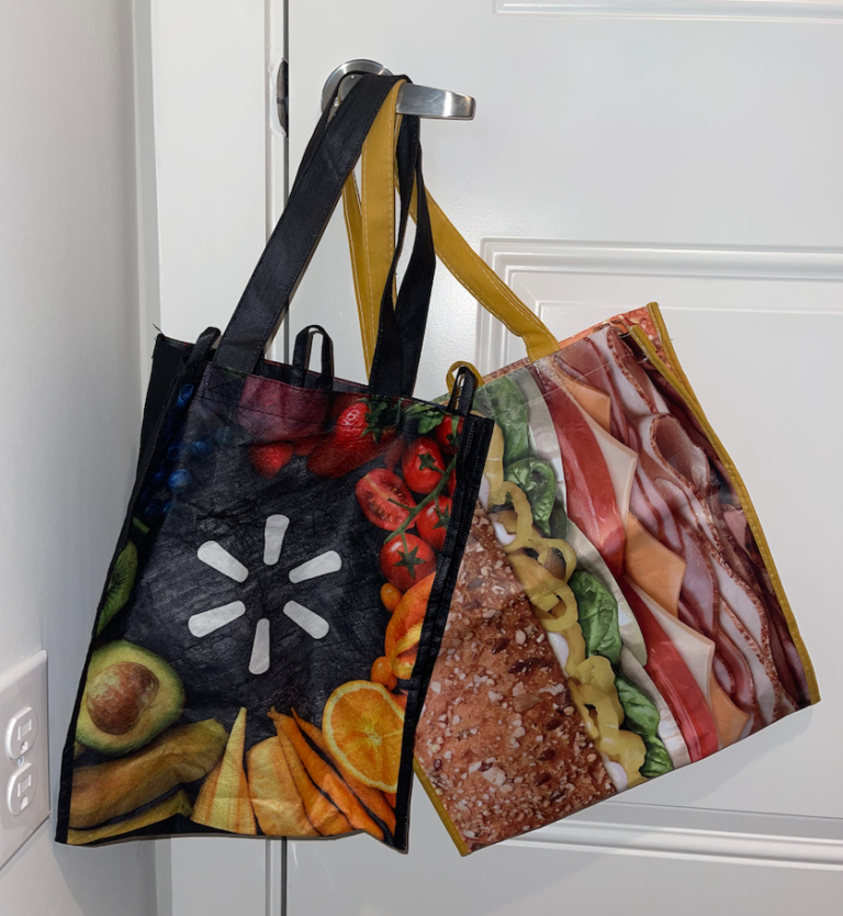 reusable grocery bags on door handle