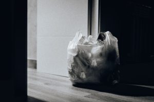 plastic bag full of trash