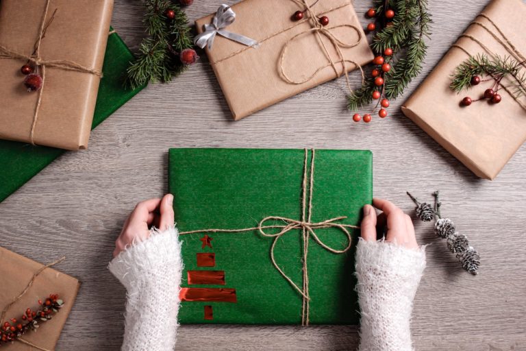 gift wrapped in green paper with twine