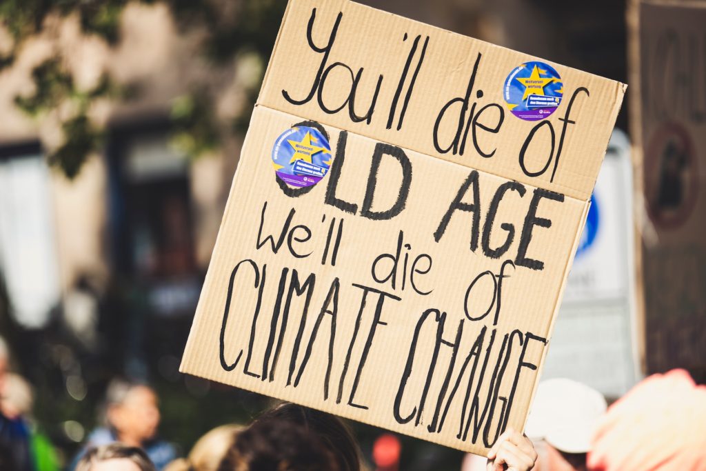 climate change sign protesting inaction
