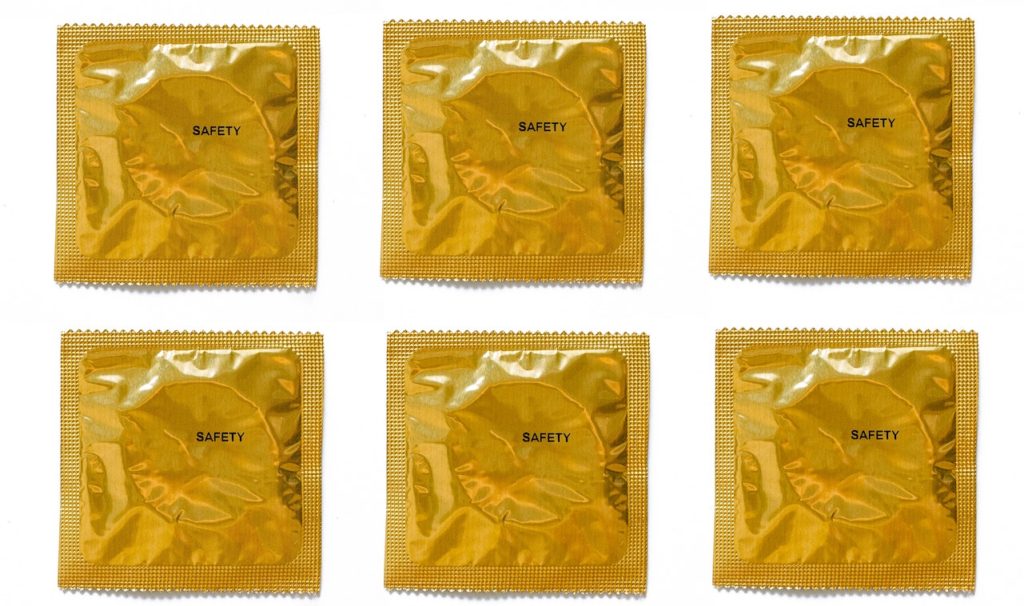 condoms in gold wrapper for date idea reminder